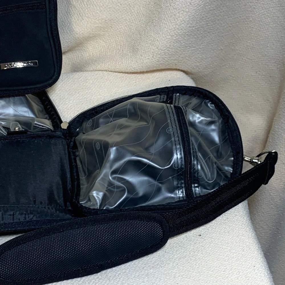 black travel bag for make up or toiletries
